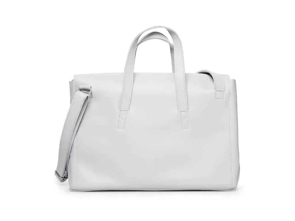White leather handbag with top handles and adjustable shoulder strap on white background